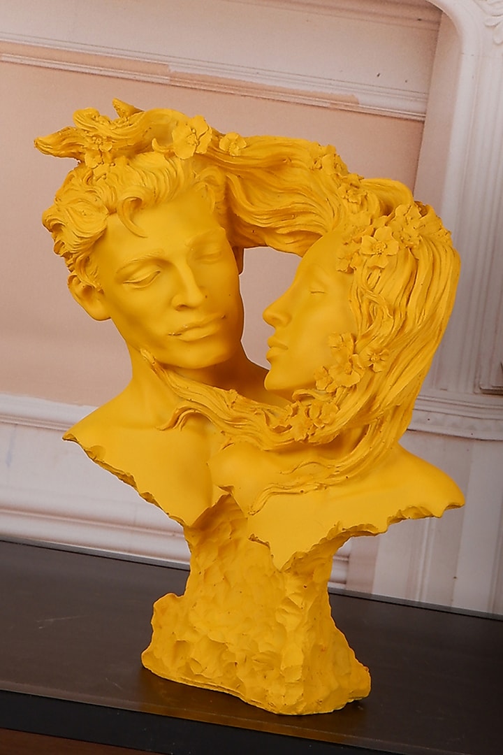 Yellow Polyresin Antique Couple Face Showpiece by The White Ink Decor
