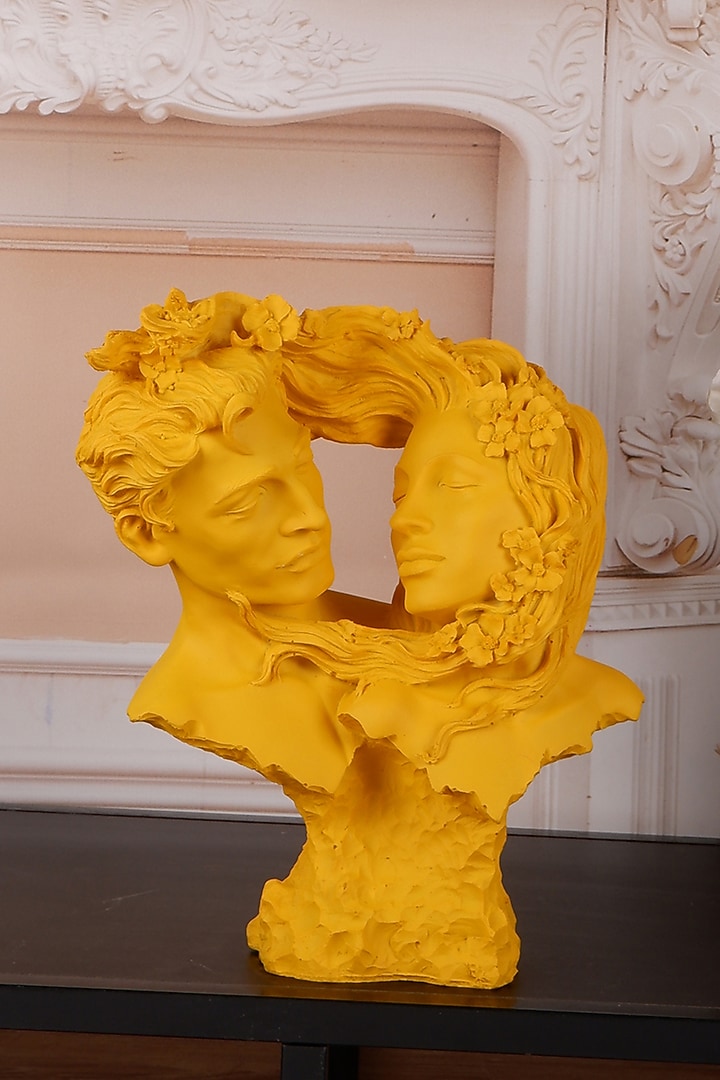 Yellow Polyresin Antique Couple Face Showpiece by The White Ink Decor at Pernia's Pop Up Shop