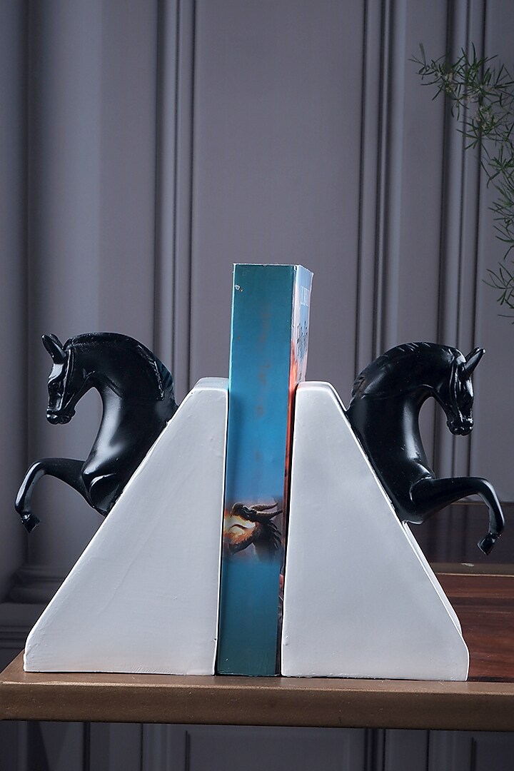 Black Polyresin Antique Bookends (Set Of 2) by The White Ink Decor at Pernia's Pop Up Shop