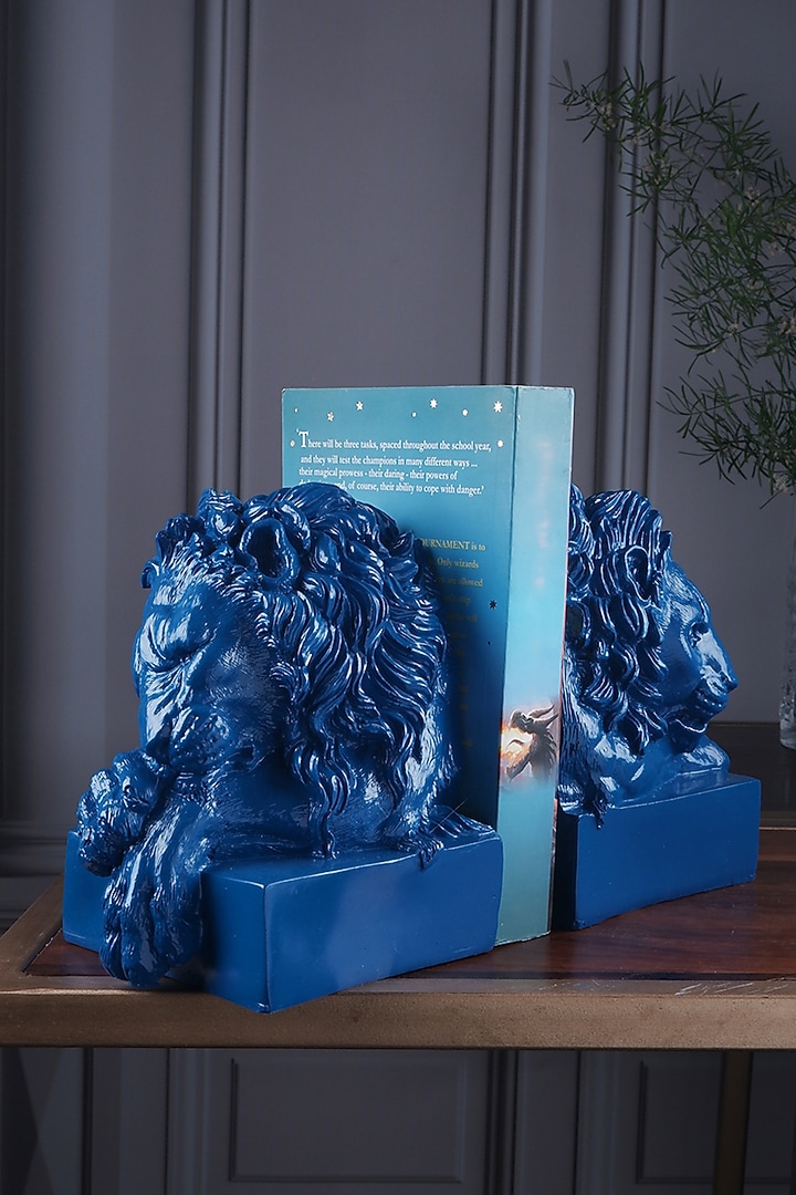 Midnight Blue Polyresin Lion Bookend (Set Of 2) by The White Ink Decor at Pernia's Pop Up Shop