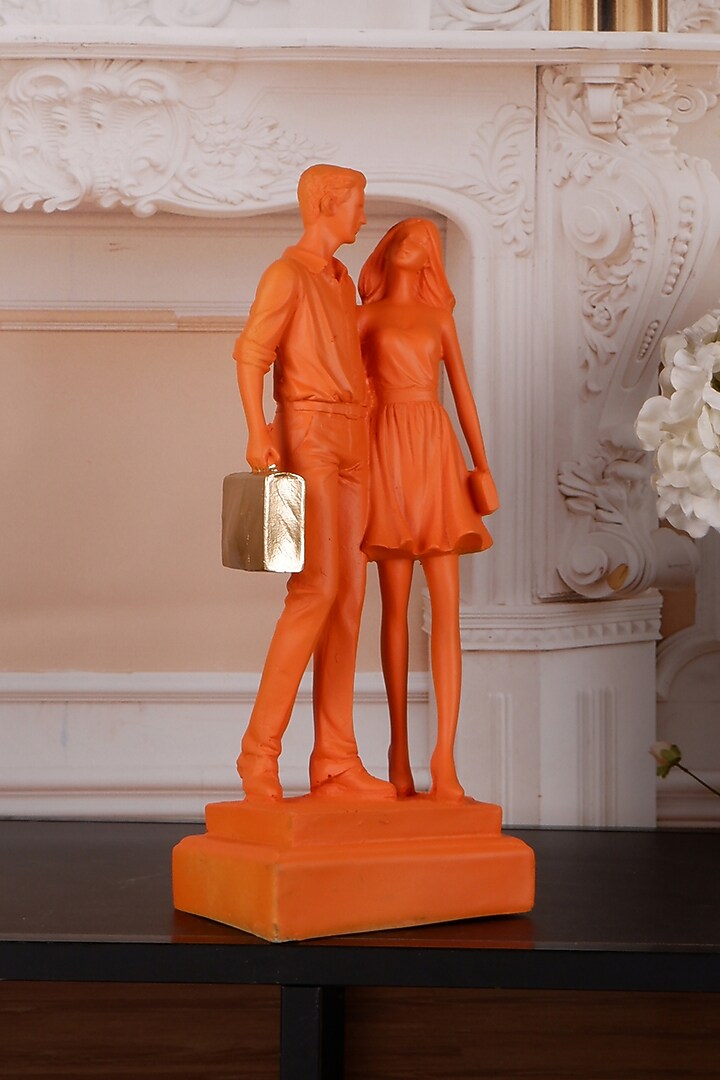 Orange Polyresin Antique Couple Showpiece by The White Ink Decor at Pernia's Pop Up Shop