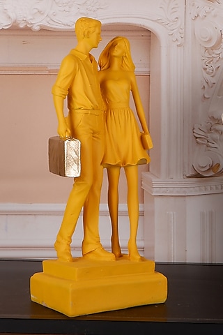 Yellow Polyresin Antique Couple Showpiece by The White Ink Decor