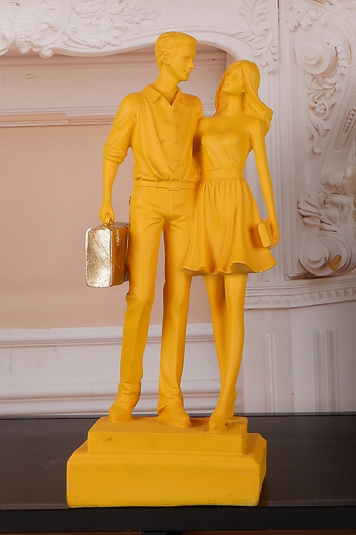 Yellow Polyresin Antique Couple Showpiece by The White Ink Decor at Pernia's Pop Up Shop