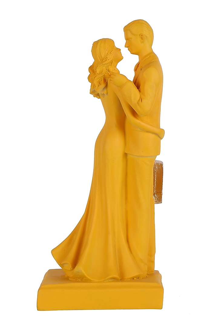 Yellow Polyresin Antique Couple Showpiece by The White Ink Decor at Pernia's Pop Up Shop