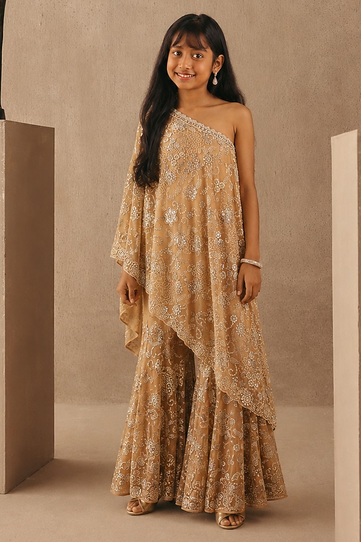 Peach Net Mirrorwork One-Shoulder Sharara Set For Girls by Twenty Nine Kids at Pernia's Pop Up Shop