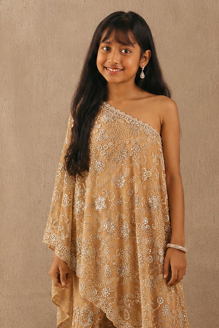 Peach Net Mirrorwork One-Shoulder Sharara Set For Girls by Twenty Nine Kids at Pernia's Pop Up Shop