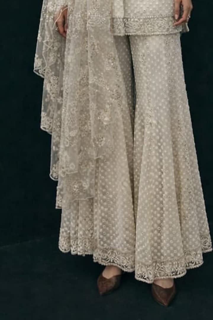 Ivory Net Mirror Work Flared Boot-Cut Pants by Twenty Nine at Pernia's Pop Up Shop