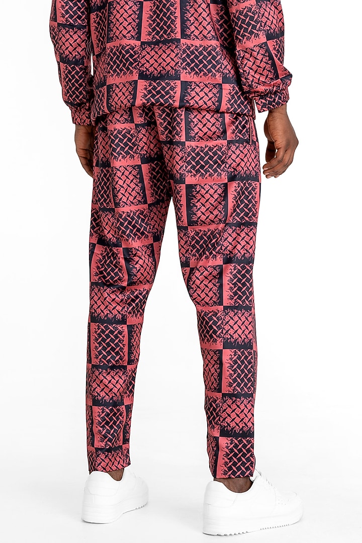 Red Polyester Printed Pants by Tezhomaya by Kavit Mehta at Pernia's Pop Up Shop