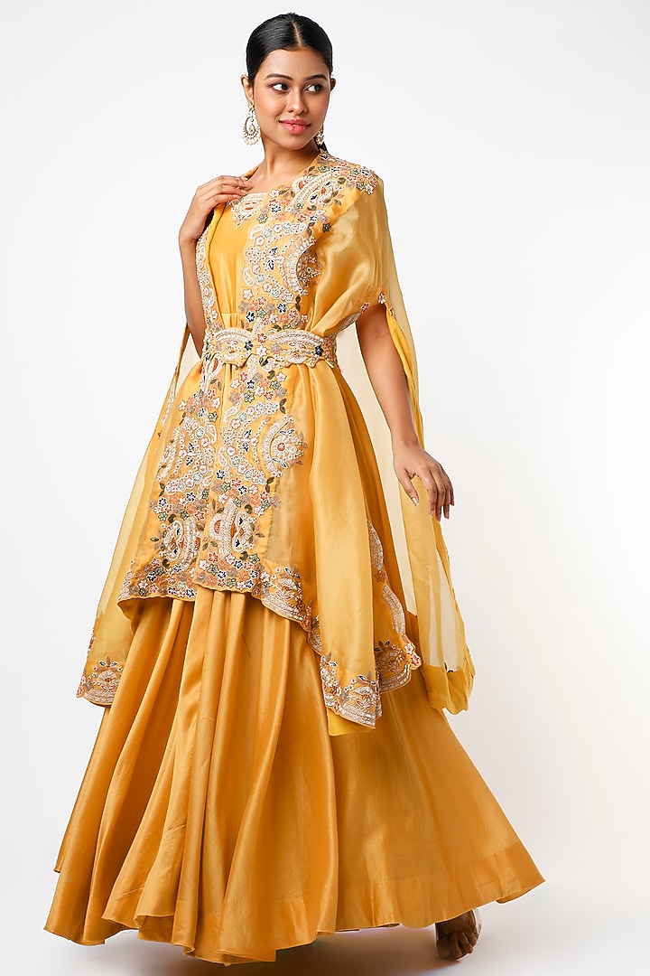 Mustard Hand Embroidered Cape Set by USHA BAGRI at Pernia's Pop Up Shop