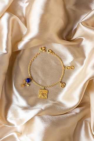 Gold Finish Indus Valley Charm Bracelet In Sterling Silver by URBANZAVERI