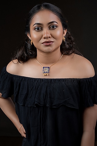Gold Finish Peepal Seal Enameled Necklace In Sterling Silver by URBANZAVERI