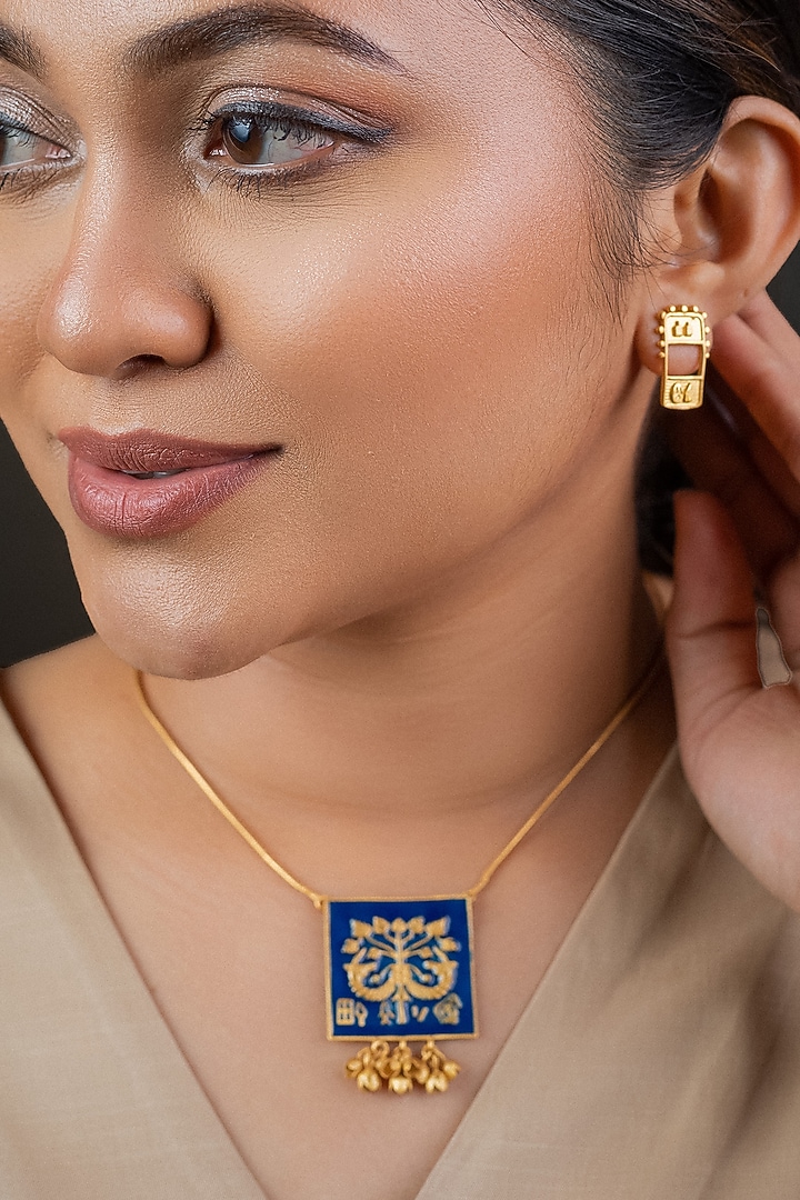 Gold Finish Peepal Seal Enameled Necklace In Sterling Silver by URBANZAVERI at Pernia's Pop Up Shop