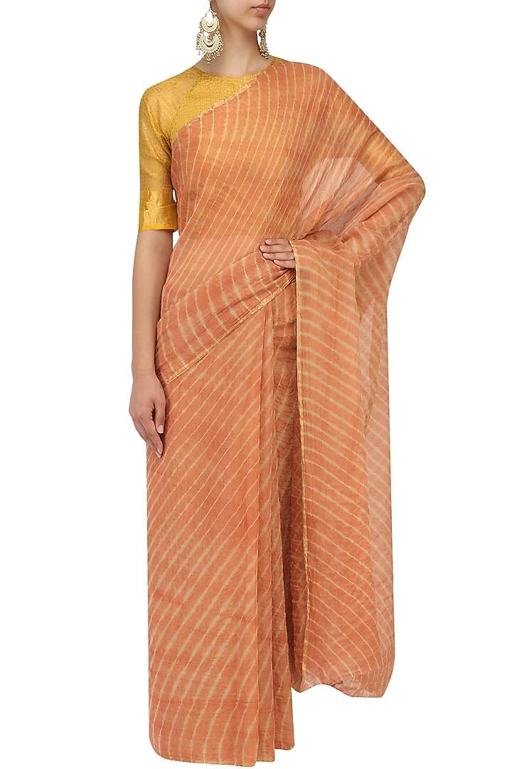 Rust leheria tissue saree available only at Pernia's Pop Up Shop.