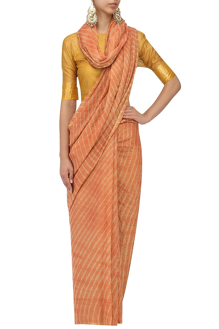 Rust leheria tissue saree available only at Pernia's Pop Up Shop.