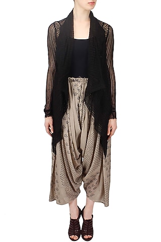Ivory shibori printed pleated salwar pants by Urvashi Kaur