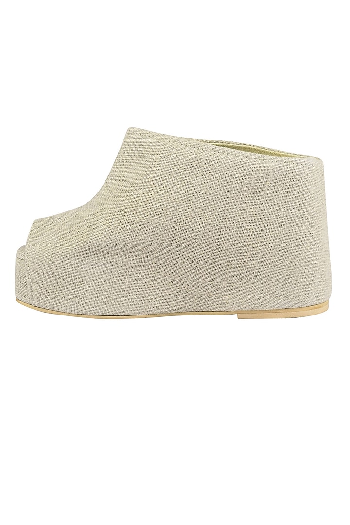 Urvashi Kaur presents Nude linen peep toe wedges available only at Pernia's Pop Up Shop.