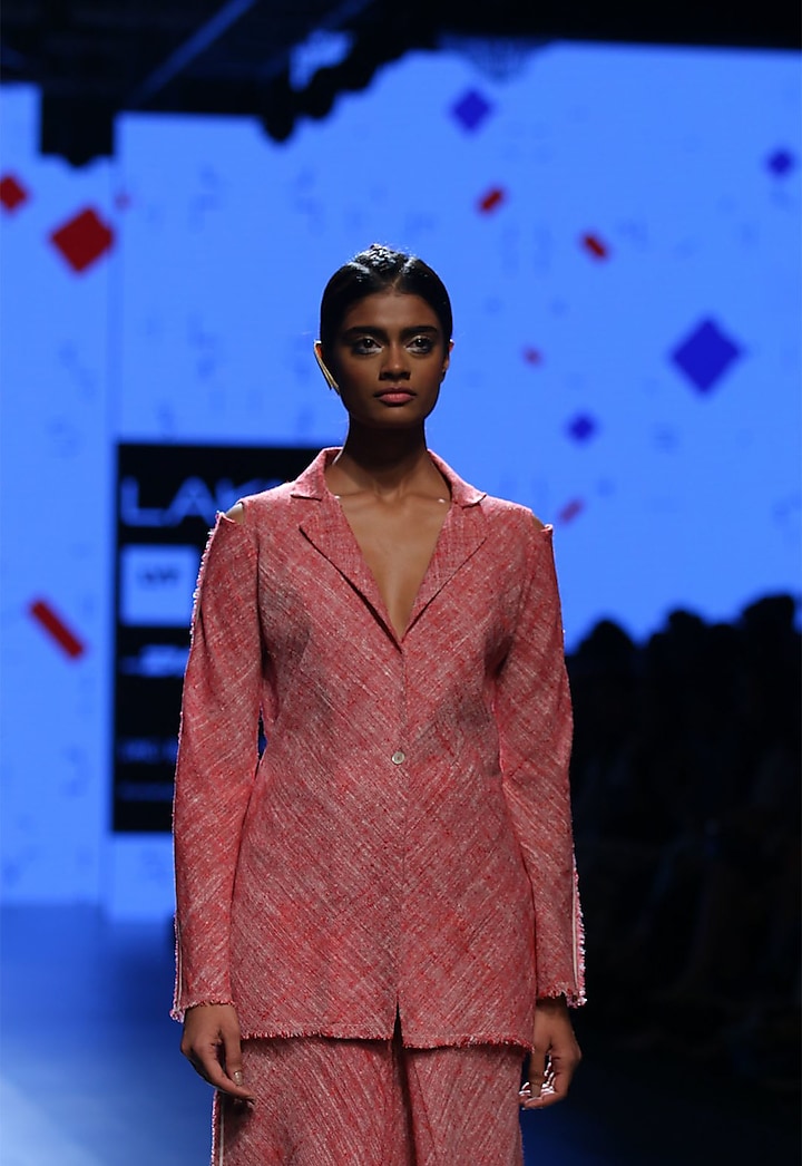 Red single button jacket by Urvashi Kaur