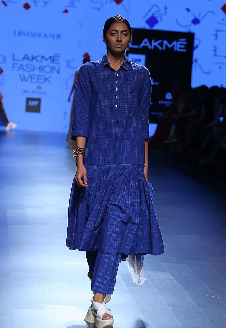Blue printed straight pants by Urvashi Kaur