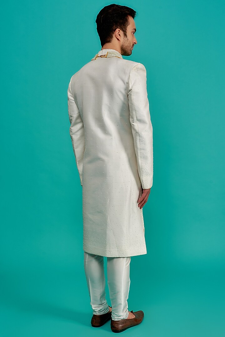 Cream Silk Hand Embroidered Groom Sherwani Set by UNIQA at Pernia's Pop Up Shop