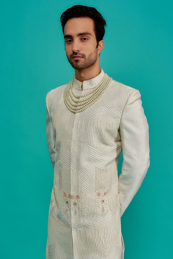 Cream Silk Hand Embroidered Groom Sherwani Set by UNIQA at Pernia's Pop Up Shop