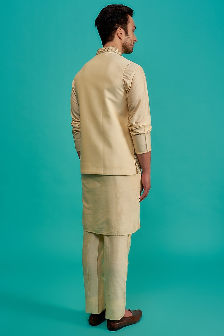 Cream Silk Embroidered Bundi Jacket Set by UNIQA at Pernia's Pop Up Shop