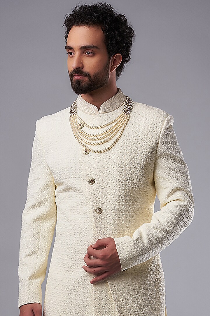Cream Silk Hand Embroidered Wedding Sherwani Set by UNIQA at Pernia's Pop Up Shop