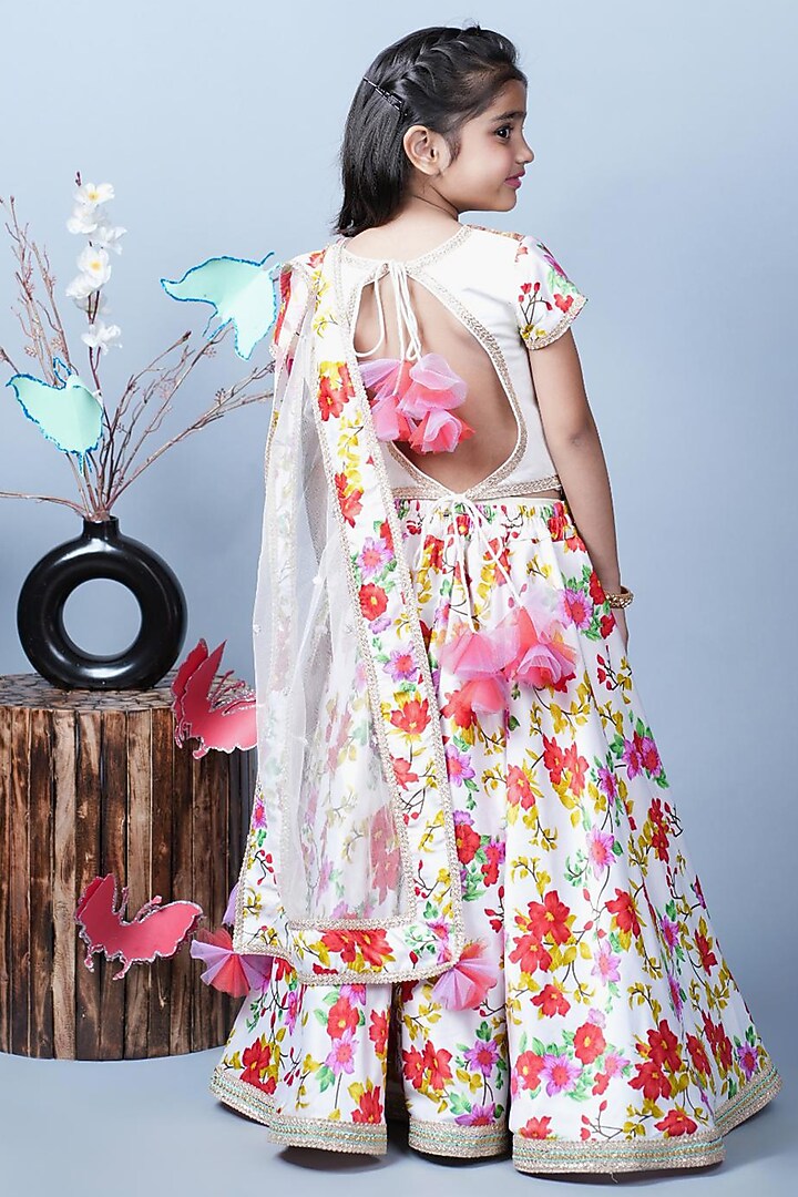 White Net & Santon Floral Printed Lehenga Set For Girls by UNIQ RIYO CREATION at Pernia's Pop Up Shop