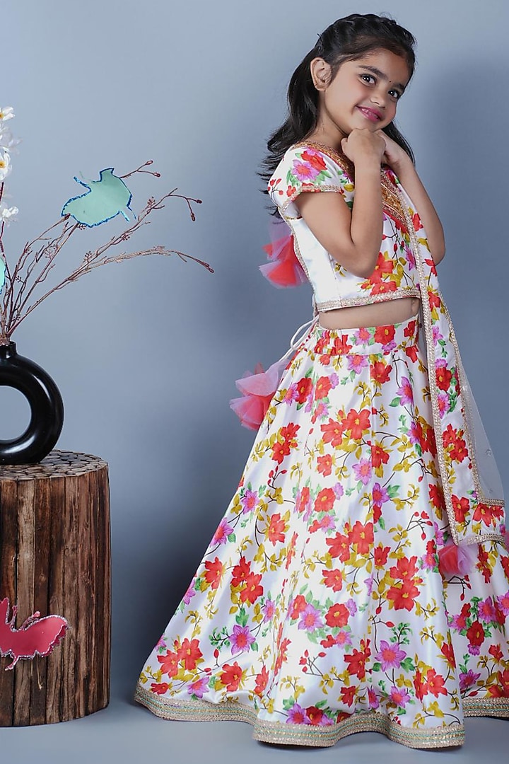 White Net & Santon Floral Printed Lehenga Set For Girls by UNIQ RIYO CREATION at Pernia's Pop Up Shop