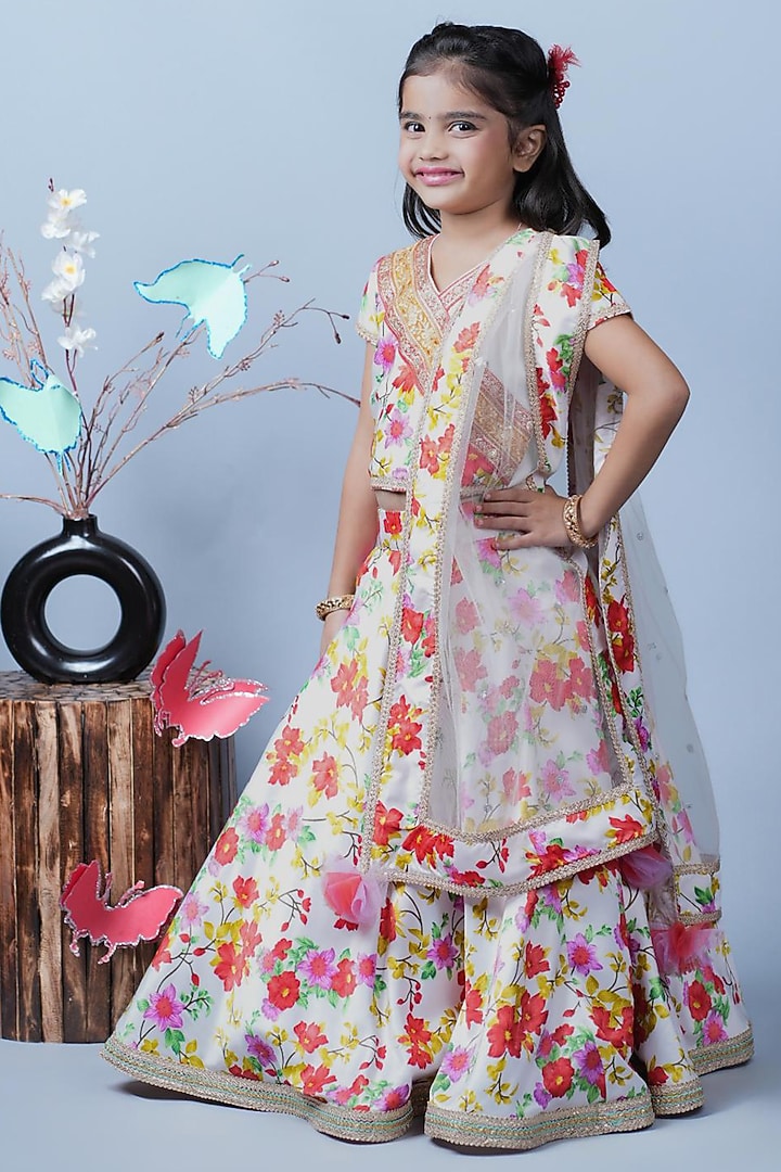 White Net & Santon Floral Printed Lehenga Set For Girls by UNIQ RIYO CREATION at Pernia's Pop Up Shop