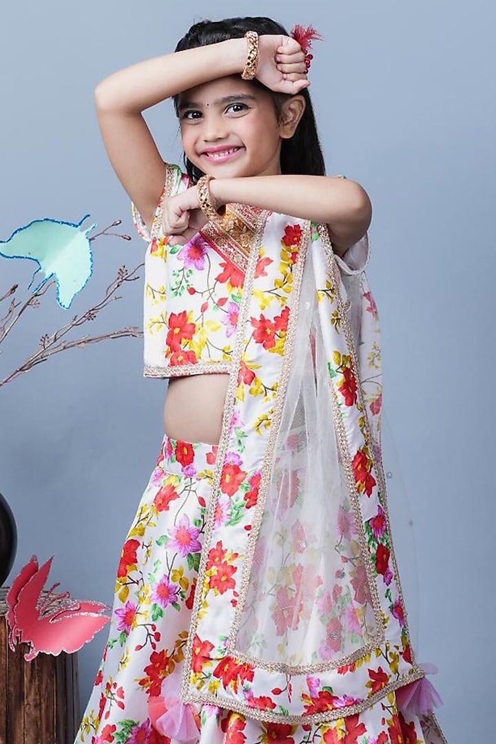 White Net & Santon Floral Printed Lehenga Set For Girls by UNIQ RIYO CREATION at Pernia's Pop Up Shop
