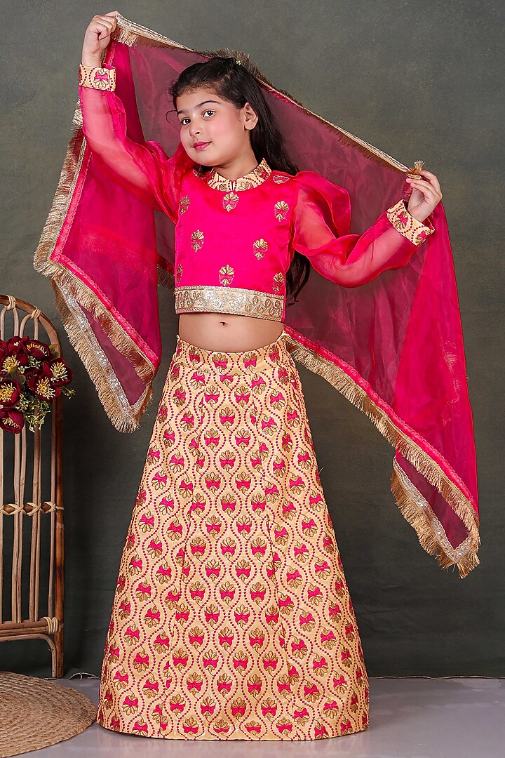 Golden Organza Embroidered Lehenga Set For Girls by UNIQ RIYO CREATION at Pernia's Pop Up Shop