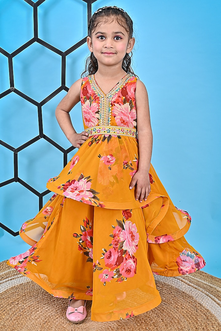 Mustard Georgette Printed & Embroidered Gown For Girls by UNIQ RIYO CREATION at Pernia's Pop Up Shop