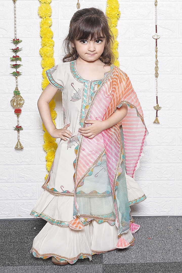 Off-White Cotton Umbrella Embroidered Kurta Set For Girls by UNIQ RIYO CREATION at Pernia's Pop Up Shop