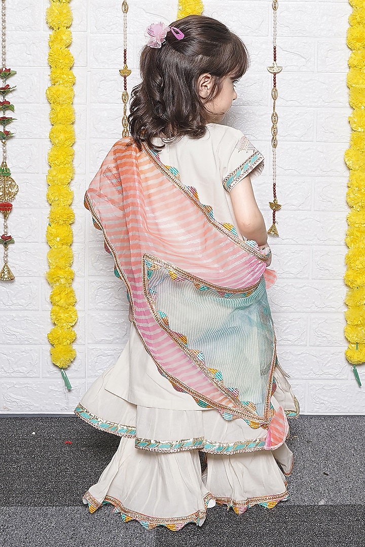 Off-White Cotton Umbrella Embroidered Kurta Set For Girls by UNIQ RIYO CREATION at Pernia's Pop Up Shop