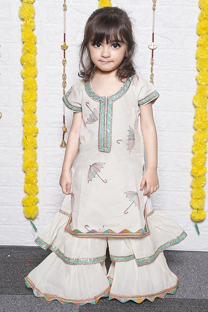 Off-White Cotton Umbrella Embroidered Kurta Set For Girls by UNIQ RIYO CREATION at Pernia's Pop Up Shop