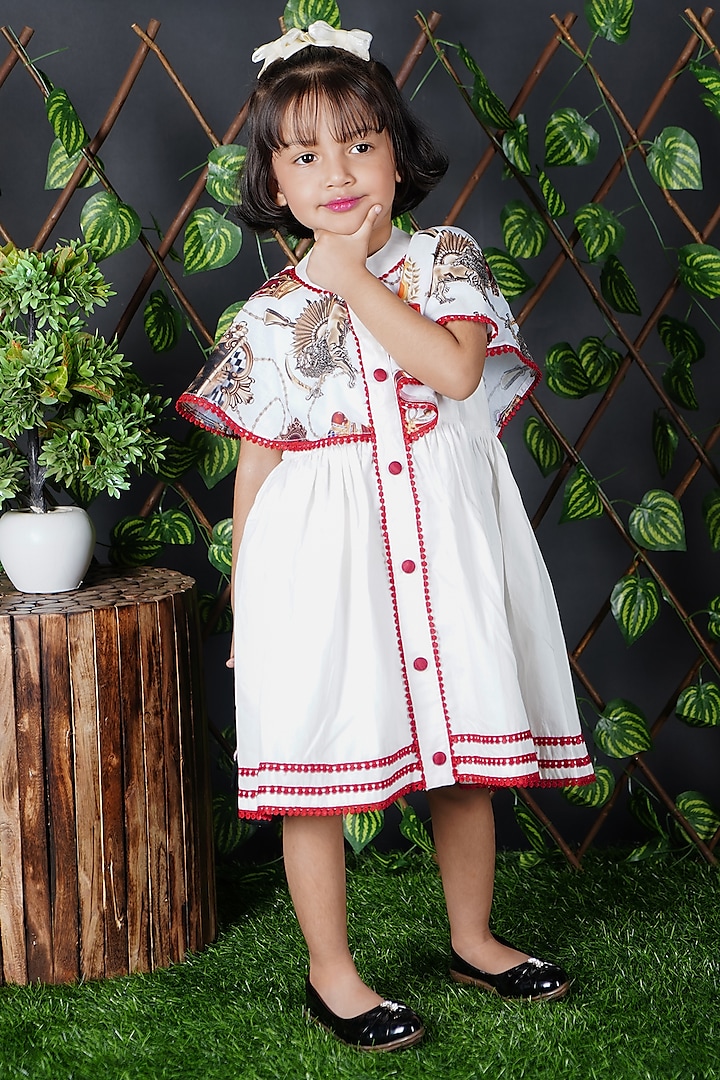 White Cotton Printed Dress For Girls by UNIQ RIYO CREATION at Pernia's Pop Up Shop