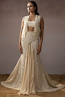 Ivory Dola & Organza Overlapping Embroidered Skirt Set by URMIL-POPULAR PRODUCTS AT STORE