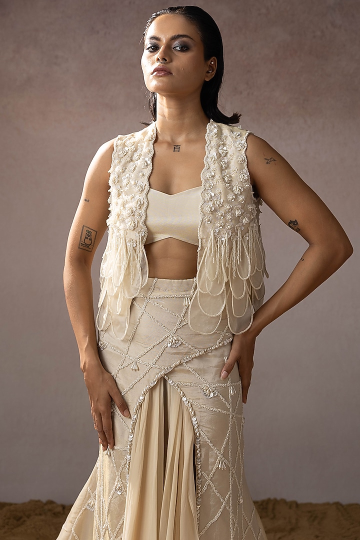 Ivory Dola & Organza Overlapping Embroidered Skirt Set by URMIL at Pernia's Pop Up Shop