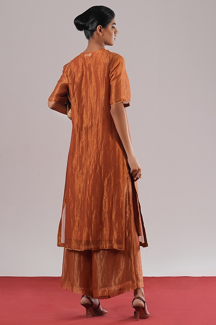 Rust Handwoven Zari Silk Heiko Pants by Urvashi Kaur at Pernia's Pop Up Shop