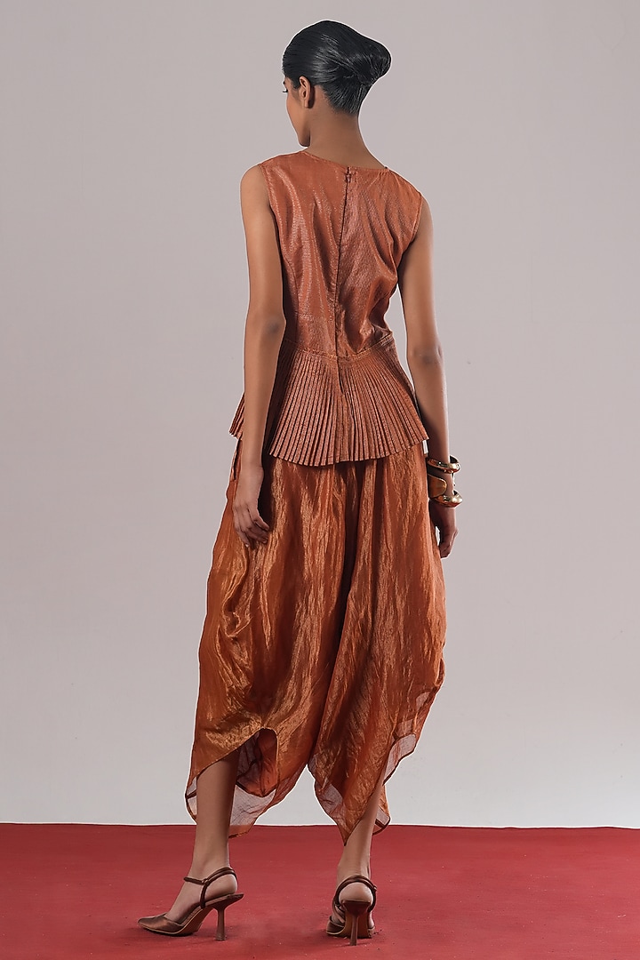 Rust Handwoven Zari Silk Pleated Peplum Top by Urvashi Kaur at Pernia's Pop Up Shop