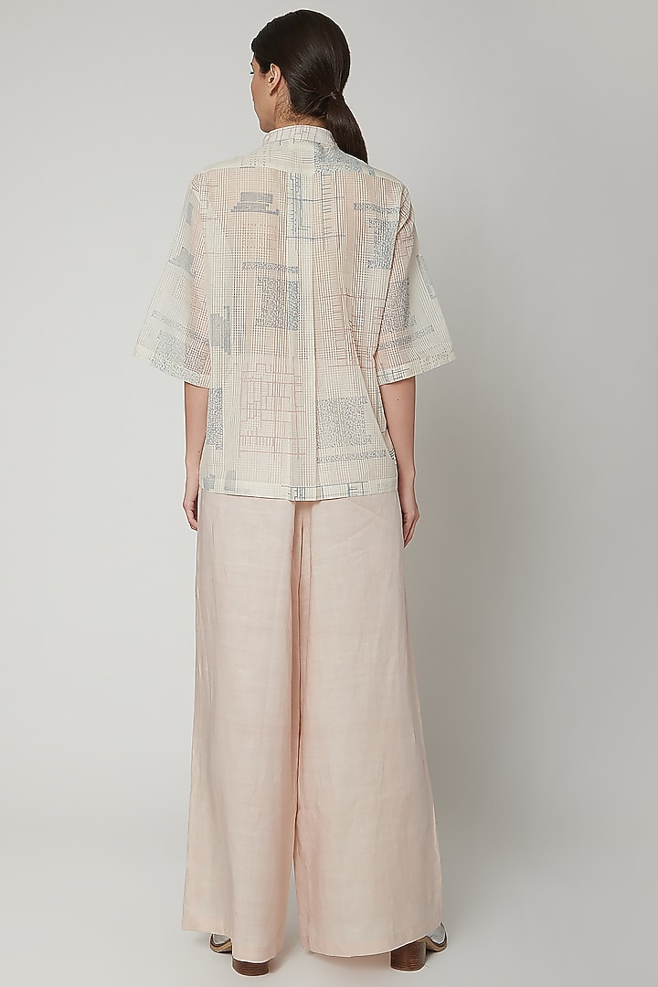 White Slouchy Linen Pants by Urvashi Kaur at Pernia's Pop Up Shop