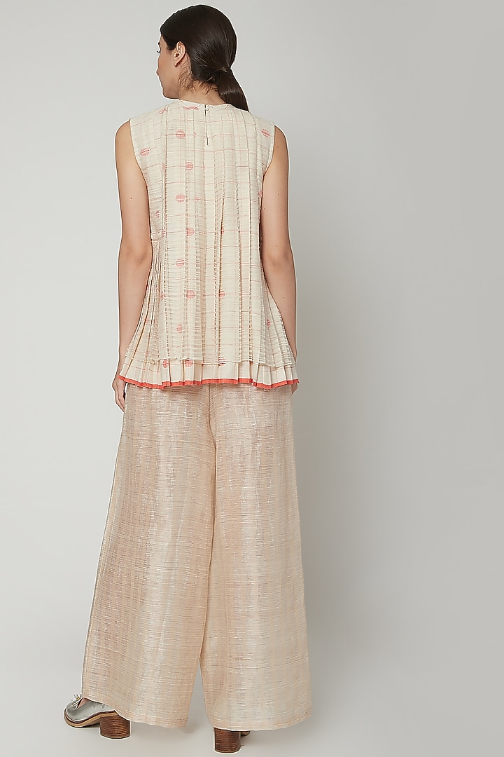 Blush Pink Pants With Metallic Yarns by Urvashi Kaur at Pernia's Pop Up Shop