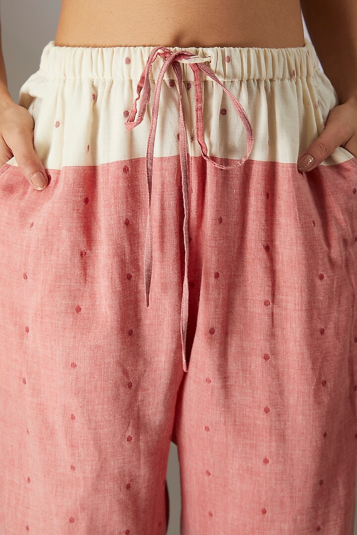 Red Handloom Dotted Jamdani Pants by Urvashi Kaur at Pernia's Pop Up Shop