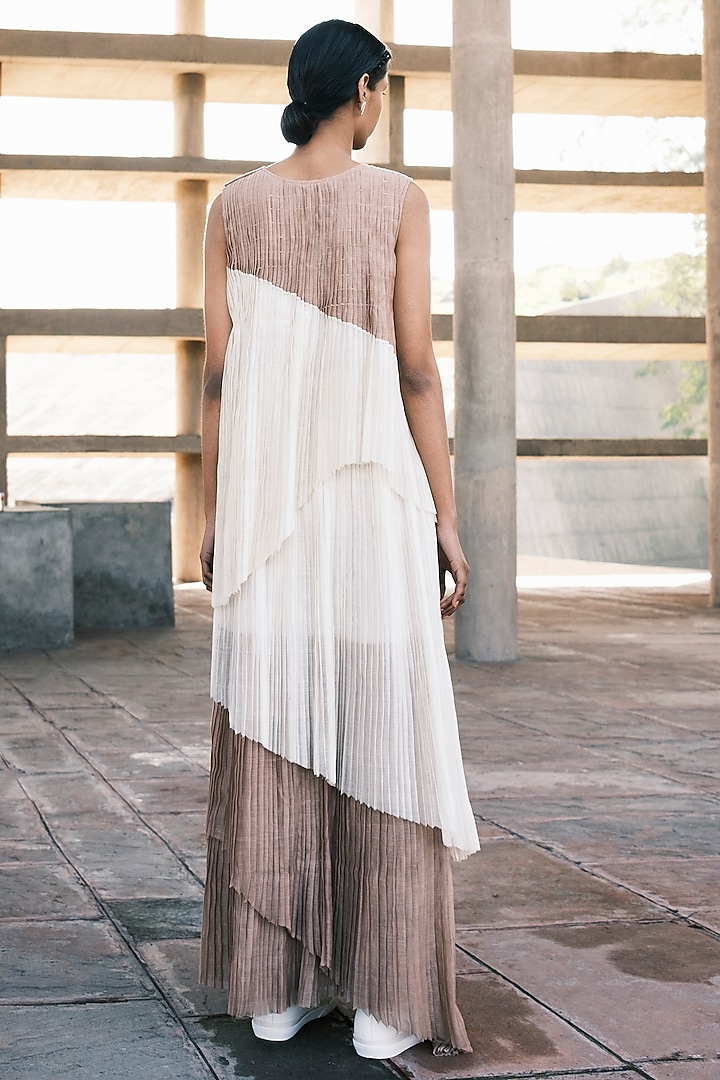 Cream Shell & Nude Chanderi Cotton Silk Pleated Asymmetric Maxi Party Wear Dress by Urvashi Kaur at Pernia's Pop Up Shop