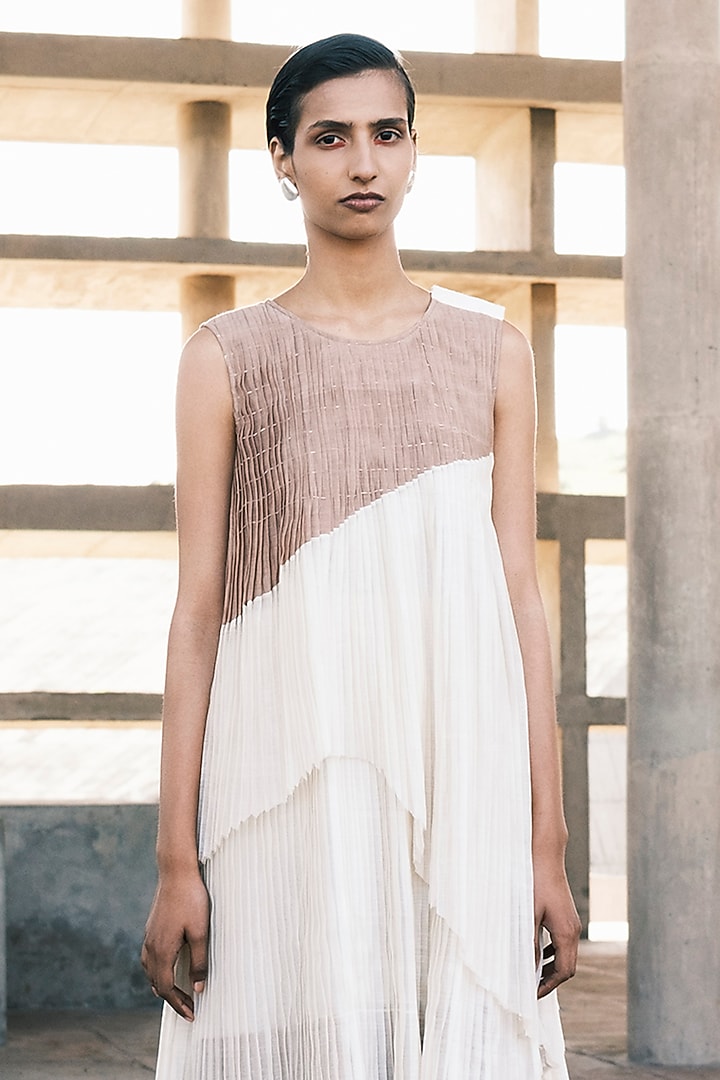 Cream Shell & Nude Chanderi Cotton Silk Pleated Asymmetric Maxi Party Wear Dress by Urvashi Kaur at Pernia's Pop Up Shop