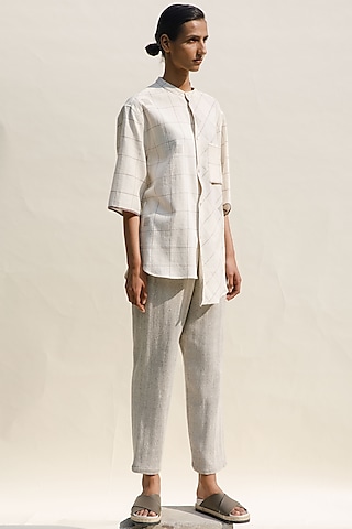 Shell Colored Handwoven Organic Cotton Khes Cropped Flared Pants by Urvashi Kaur