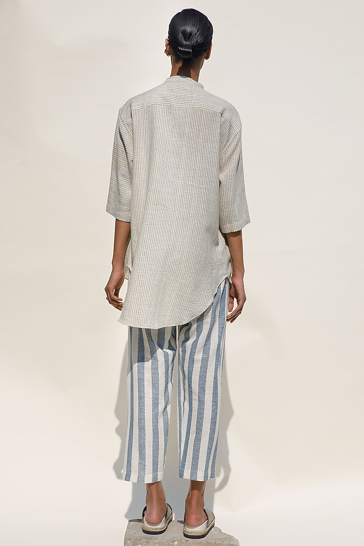 Shell-Colored Handloom Cotton Striped Narrow Pants by Urvashi Kaur at Pernia's Pop Up Shop