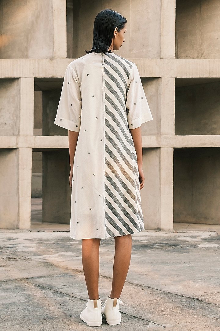 Shell-Colored & Charcoal Handspun Cotton Jamdani Flared Striped Vacation Dress by Urvashi Kaur at Pernia's Pop Up Shop