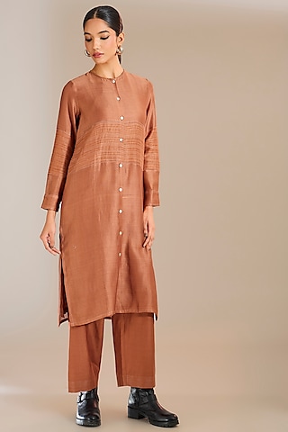 Rust Striped Chanderi Silk Jaal Work Tunic by Urvashi Kaur
