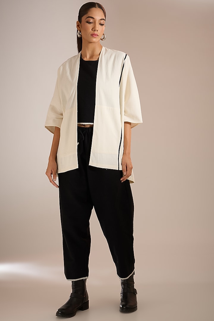 White Handloom Denim Block Printed Paneled Jacket by Urvashi Kaur at Pernia's Pop Up Shop
